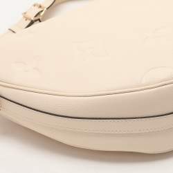 Pre Owned Louis Vuitton Creme Empreinte Leather Loop Hobo