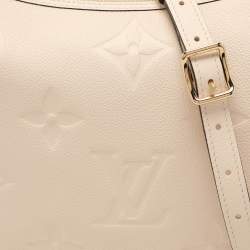 Pre Owned Louis Vuitton Creme Empreinte Leather Loop Hobo