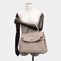 Pre Owned Louis Vuitton Greige Taurillon Rock Me Ever bag