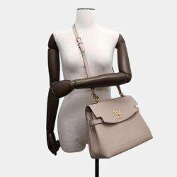 Pre Owned Louis Vuitton Greige Taurillon Rock Me Ever bag