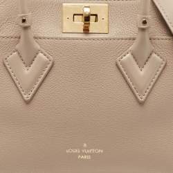 Pre Owned Louis Vuitton Galet Monogram Mahina Leather On My Side PM Bag