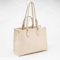 Pre Owned Louis Vuitton Cream Monogram Empriente Leather Giant Onthego MM Bag