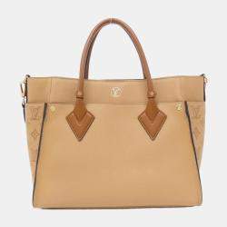 Pre Owned Louis Vuitton Leather Mahina On My Side MM Handbag