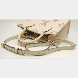 Louis Vuitton Cream Bicolor Monogram Empreinte Leather OnTheGo PM Tote Bag
