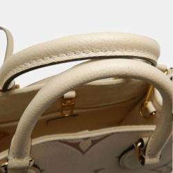 Louis Vuitton Cream Bicolor Monogram Empreinte Leather OnTheGo PM Tote Bag