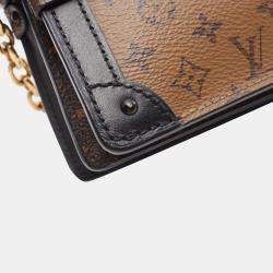 Louis Vuitton   Canvas Reverse Monogram Trunk Clutch Bag