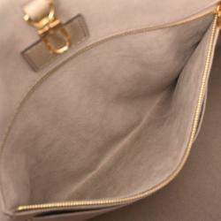 Louis Vuitton On The Go MM Monogram Empreinte Tote Bag
