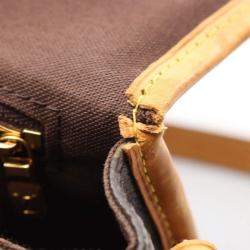 Pre Owned Louis Vuitton Menilmontant PM Brown Monogram Canvas Crossbody Bag