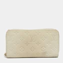 Pre Owned Louis Vuitton Off White Monogram Empreinte Leather Zippy Wallet