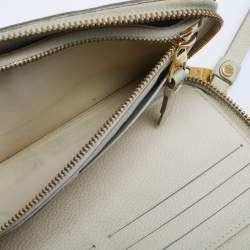 Pre Owned Louis Vuitton Off White Monogram Empreinte Leather Zippy Wallet