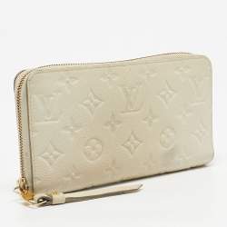 Pre Owned Louis Vuitton Off White Monogram Empreinte Leather Zippy Wallet
