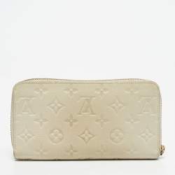 Pre Owned Louis Vuitton Off White Monogram Empreinte Leather Zippy Wallet