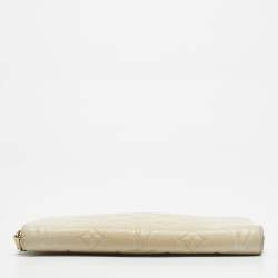 Pre Owned Louis Vuitton Off White Monogram Empreinte Leather Zippy Wallet