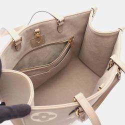Pre Owned Louis Vuitton On The Go MM Tourterelle Monogram Empreinte Leather Tote Bag
