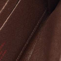 Pre Owned Louis Vuitton Damier Ebene Canvas Zippy Wallet