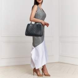 Pre Owned Louis Vuitton Marine Rogue Monogram Empreinte Leather Montaigne MM Bag