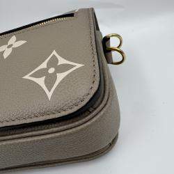 Pre Owned Louis Vuitton Tourterelle Monogram Empreinte Leather Pochette Metis East West Crossbody Bag