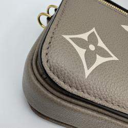Pre Owned Louis Vuitton Tourterelle Monogram Empreinte Leather Pochette Metis East West Crossbody Bag