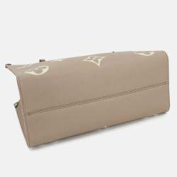 Pre Owned Louis Vuitton Onthego MM Tourterelle Creme Monogram Empreinte Leather Tote Bag