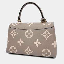 Pre Owned Louis Vuitton Beige Leather Empreinte Madeleine MM