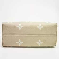 Pre Owned Louis Vuitton Sunset Khaki Monogram Giant Empreinte Leather Onthego MM Bag