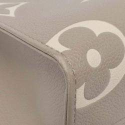 Pre Owned Louis Vuitton Two-Tone Monogram Empreinte On-The-Go Pm Handbag