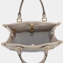 Pre Owned Louis Vuitton Two-Tone Monogram Empreinte On-The-Go Pm 2-Way Tote Tourterelle Creme