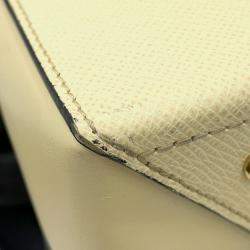 Pre Owned Louis Vuitton City Frame Yellow Taiga Leather