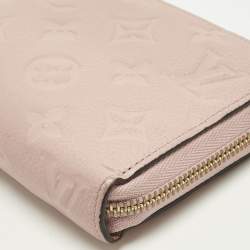 Pre Owned Louis Vuitton Rose Poudre Monogram Empreinte Leather Zippy Wallet