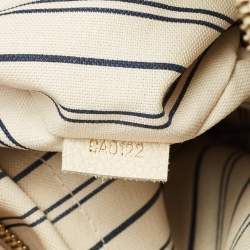 Pre Owned Louis Vuitton Neige Monogram Empreinte Leather Citadine PM Bag