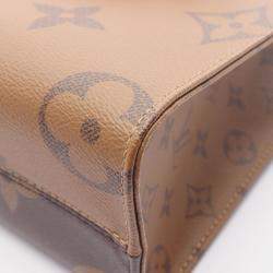 Pre Owned Louis Vuitton On The Go Pm Handbag Coated Canvas Monogram Giant Reverse Brown And Beige