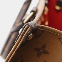 Pre Owned Louis Vuitton On The Go Pm Handbag In Coated Canvas With Monogram Giant Reverse Brown And Beige