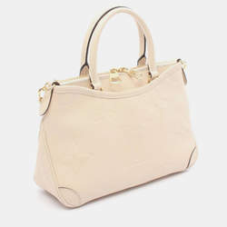 Pre Owned Louis Vuitton Trianon Pm Handbag In Monogram Empreinte Leather Beige
