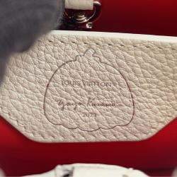 Pre Owned حقيبة لويس فويتون كابوسينيس زهر نفسي/أبيض جلد توريلون مقاس بي بي