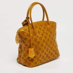 مملوكة مسبقًا Louis Vuitton Lock It PM Mustard Monogram Fascination Bag