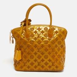 مملوكة مسبقًا Louis Vuitton Lock It PM Mustard Monogram Fascination Bag