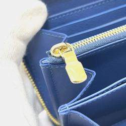 مملوكة مسبقًا محفظة لوي فيتون زيببي نايل زرقاء دينيم أحر ف LV و TM