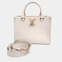 Pre Owned Louis Vuitton Cream Leather Lock & Go