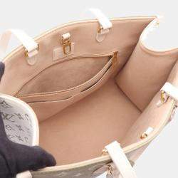 Pre Owned حقيبة لوي فيتون أون ذا غو متوسطة مونوجرام إمبريونت جلد كاكي وعاجي