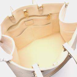 Pre Owned حقيبة توت لوي فيتون أون ذا غو أم أم مونوجرام إمبريانت جلد عاجي