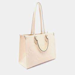 Pre Owned حقيبة توت لوي فيتون أون ذا غو أم أم مونوجرام إمبريانت جلد عاجي