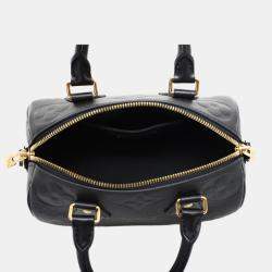 مملوكة مسبقًا ```json
{"name": "Louis Vuitton Bandouliere 20 Monogram Empreinte Speedy Bag", "name_ar": "حقيبة سبيدي لوي فيتون باندولير 20 مونوغرام إمبريانت"}
```