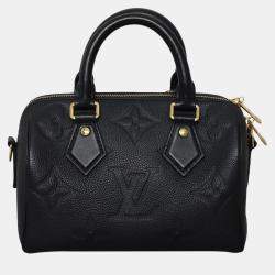 مملوكة مسبقًا ```json
{"name": "Louis Vuitton Bandouliere 20 Monogram Empreinte Speedy Bag", "name_ar": "حقيبة سبيدي لوي فيتون باندولير 20 مونوغرام إمبريانت"}
```