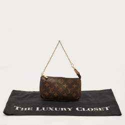 مملوكة مسبقًا Louis Vuitton Mini Monogram Canvas Pochette Accessoires