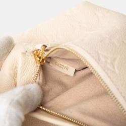 Pre Owned Louis Vuitton Beige Monogram Empreinte Montsouris PM Backpack
