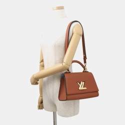 مملوكة مسبقًا حقيبة لويس فيتون تويست ون هندل كاراميل توريلون جلد بحجم بي إم