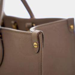 Pre Owned Louis Vuitton Brown Monogram Empreinte OnTheGo MM