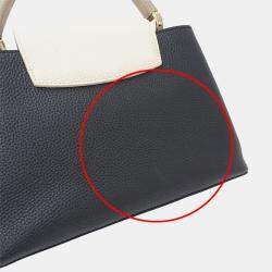 Pre Owned حقيبة لوي فيتون كابوسينز MM جلد توريلون أسود/كريم/غال أسود