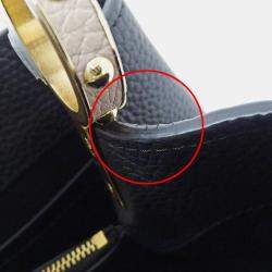 Pre Owned حقيبة لوي فيتون كابوسينز MM جلد توريلون أسود/كريم/غال أسود