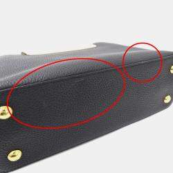 Pre Owned حقيبة لوي فيتون كابوسينز MM جلد توريلون أسود/كريم/غال أسود